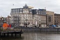 AMSTERDAM, NETHERLANDS - JUNE 25, 2017: View to the Victoria Hotel opened on 1890 on the Prins Hendrikkade st.