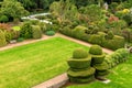 A view to a well maintained landscaped garden from one of the rooms in Crathes Castle, Scotland