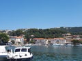 View to the white fisherman`s boats on marina with city and sea landscape background in Rab Croatia