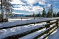 View to a winter landscape with wooden fence, near to Marisel village from Cluj county, Romania Royalty Free Stock Photo