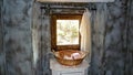 View into toilette room with natural stone wall mediterranean style, roll toilette paper in basket, window with bright natural Royalty Free Stock Photo