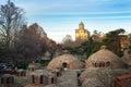 View on top of abanotubani, sulfur baths and Metekhi church in Tbilisi, Georgia