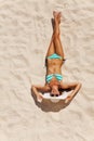 View from top of beautiful woman in bikini on sand Royalty Free Stock Photo