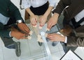 View from the top.business team folding puzzle pieces. Royalty Free Stock Photo