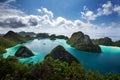 View from the top of the cliff at remote archipelago Pulau Wayag, Raja Ampat, Indonesia