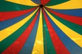 View into the top of a colorful striped circus tent, festival event concept