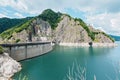 View from the top of the dam Vidraru to the landscape of mountains and lake Vidraru, Romania Royalty Free Stock Photo