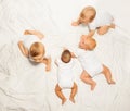 View from top of four sweet babies backs crawling Royalty Free Stock Photo