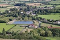 View from the top of Glastonbury Tor, overlooking the Somerset Levels. A small reservoir can be seen in the foreground Royalty Free Stock Photo