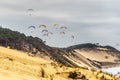 View from the top of the Grande Dune du Pilat on the Atlantic Ocean and paraplans in France Royalty Free Stock Photo