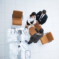 View from the top.the handshake business partners at a business meeting Royalty Free Stock Photo