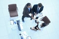 View from the top.the handshake business partners at a business meeting Royalty Free Stock Photo