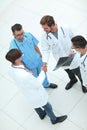 Handshake two doctors at the meeting. Royalty Free Stock Photo