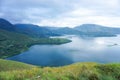 View from the top of Lake Toba hill with views of the hills and beautiful blue lake water Royalty Free Stock Photo