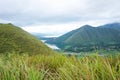 View from the top of Lake Toba hill with views of the hills and beautiful blue lake water Royalty Free Stock Photo