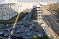 View from the top of a large open car parking and indoor multi-level parking in a residential area of the big city Royalty Free Stock Photo