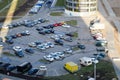 View from the top of a large open car parking and indoor multi-level parking in a residential area of the big city Royalty Free Stock Photo