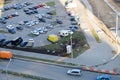 View from the top of a large open car parking and indoor multi-level parking in a residential area of the big city Royalty Free Stock Photo