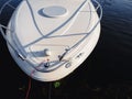 View from top on moored motorboat bow on a lake Royalty Free Stock Photo