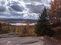 View on top of mountain in Adirondacks of lake and fall foliage