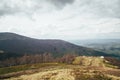 A view from the top of the mountain Gemba or Gimba down to the cablecar, meadow and village Pilipec, Carpathian