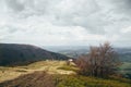 A view from the top of the mountain Gemba or Gimba down to the cablecar, meadow and village Pilipec, Carpathian mountains, Ukraine