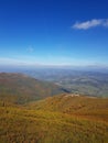 view from the top of the mountain mountain landscape and the settlement below Royalty Free Stock Photo