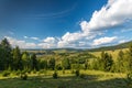 View from the top of the mountain, small hungarian village in the valley in Transylvania