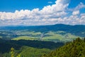 View from the top of the mountain to the Sromowce village by the river. Royalty Free Stock Photo