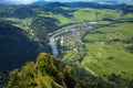 View from the top of the mountain to the Sromowce village by the river. Royalty Free Stock Photo