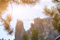 view of top of mountain to which suspension bridge leads and crowd wanting to go through it Royalty Free Stock Photo