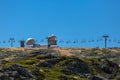 View at the top of the mountains of the Serra da Estrela natural park, tower buildings with dome and cable car railway circuit, Royalty Free Stock Photo