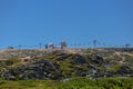 View at the top of the mountains of the Serra da Estrela natural park, tower buildings with dome and cable car railway circuit, Royalty Free Stock Photo