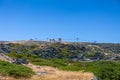 View at the top of the mountains of the Serra da Estrela natural park, tower buildings with dome and cable car railway circuit, Royalty Free Stock Photo