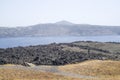 View from the top of Nea Kameni to island Santorini