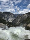 View from the top of Nevada Falls in Yosemite National Park, California with blue clouds above Royalty Free Stock Photo