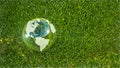 View from top of planet Earth crystal ball on a green field 3D rendering Royalty Free Stock Photo