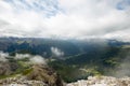 View from top of Sass Pordoi down in the Valleys of Fassa. Wide Landscape of the Dolomites in Italy Royalty Free Stock Photo