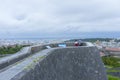 Shuri Castle rampart overlooking Okinawa skyline in Naha, Okinawa, Japan Royalty Free Stock Photo