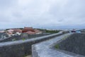 Shuri Castle rampart overlooking Okinawa skyline in Naha, Okinawa, Japan Royalty Free Stock Photo