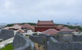 Shuri Castle rampart overlooking Okinawa skyline in Naha, Okinawa, Japan Royalty Free Stock Photo