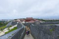 Shuri Castle rampart overlooking Okinawa skyline in Naha, Okinawa, Japan Royalty Free Stock Photo