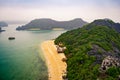 View from the top of an small island with deserted beach, clear sea and beautiful landscape with karst stone islands in the water Royalty Free Stock Photo