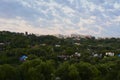 View from top on small town with a lot of trees. Urban greening