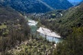 View from the top to the cascades in the jungle. River meandering through forested landscape. Panoramic view from above of Royalty Free Stock Photo