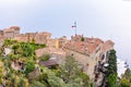 View from top to village buildings, tourists walking and sea Royalty Free Stock Photo