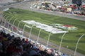 Car racing and fans. Competition at Daytona International speedway.