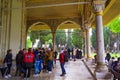 Tourists in Topkapi Palace courtyard on rainy spring day Istanbul Turkey Royalty Free Stock Photo