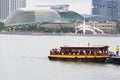 View of a tourist boat and Esplanade, Singapore, December 15, 2017 Royalty Free Stock Photo