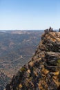 View of a tourist couple looking and shot a picture on Penedo Duro viewpoint and cliff, iconic ant tall place good to see the Royalty Free Stock Photo